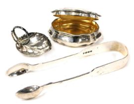 A pair of Victorian silver sugar tongs, London 1861, leaf shaped dish, Birmingham 1969, and a Victor