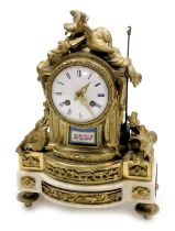 A late 19thC French ormolu marble and porcelain mantel clock, circular enamel dial bearing Roman num