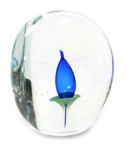 A Beranek Czech glass paperweight, inset with a blue flower, 17cm high.