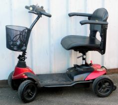 An ST1D Strider red mobility scooter, with battery and key. (AF)