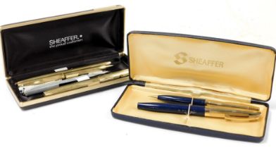 A Sheaffer gold plated fountain pen, with a 14ct gold nib, together with a ballpoint pen and propell