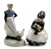 A Royal Copenhagen porcelain figure of a girl with a goose, no. 528, 19.5cm high, printed and painte