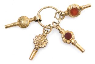 Four 19thC pinchbeck watch keys, with embossed or engraved decoration, one set with a bloodstone and
