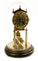 A Kundo brass 400 day anniversary clock, with circular base and glass dome, 23cm high.