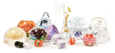 A group of glass paperweights and ornaments, including a teapot weight, pearl in a crystal oyster, i