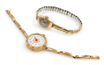 A mid century "Dot" lady's 9ct gold cased wristwatch, circular engine turned silvered dial bearing A