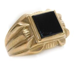 A gentleman's 9ct gold and black onyx signet ring, size V½, 10.2g.