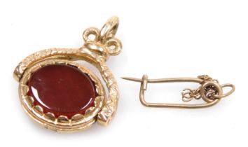 A 9ct gold swivel fob, set with an oval bloodstone and a carnelian, and a yellow metal pin, 5.0g.