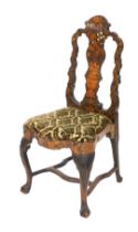 An 18thC Dutch marquetry inlaid salon chair, the carved back with a vase shaped splat, inlaid with a