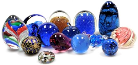 A group of glass paperweights, including a Jane Charles studio glass weight, Murano glass swirl pape