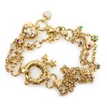A David Morris 18ct gold diamond and gem set charm bracelet, with various charms as fitted, on a bol