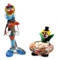 A Murano glass figure of a clown, modelled standing wearing a cape, 26.5cm high, and a Murano glass