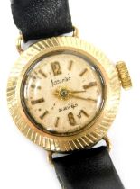 A mid century Accurist 9ct gold cased lady's circular wristwatch, champagne dial bearing Arabic nume