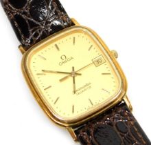 An Omega Seamaster gentleman's gold plated wristwatch, rectangular dial, with centre seconds, date a
