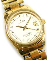 A Omega Seamaster lady's gold plated wristwatch, circular dial, with batons, centre seconds, and dat