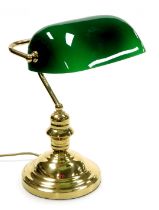 A brass desk lamp, with a green glass shade, 26cm wide. Buyer Note: WARNING! This lot contains untes