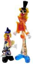 A Murano narrow glass figure of a clown, with orange buttons and bow tie, 53cm high, and a further f