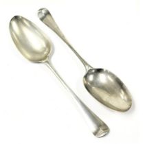 A pair of George II silver Hanoverian pattern dessert spoons, monogram engraved, maker's mark E O, L