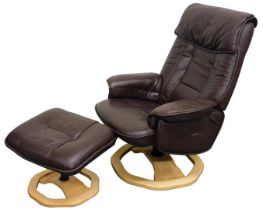A Stressless brown leather swivel armchair, on a light wood base, together with a matching stool. (