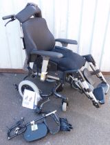 A Breezy manual wheelchair, with adjustable head foot and arm rests, no. 1015098C, with instructions