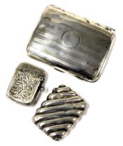 An Edward VII curved silver cigarette case, with engine engraved banding, and circular reserve, mono