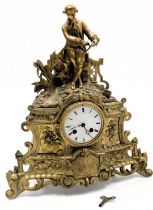 A late 19thC French brass cased mantel clock, circular enamel dial bearing Roman numerals, eight day