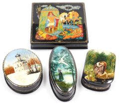 A Russian painted lacquer box and cover, of square section, decorated to the lid with a prince in a