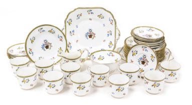 An early 20thC Aynsley porcelain tea service, decorated with baskets of flowers, pattern number B204