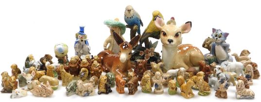 A group of Wade Whimsies, KP Friar figures, figure of Tom from Tom and Jerry, dinosaurs, and Lady an