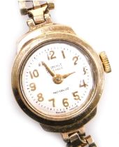 A Summit lady's 9ct gold wristwatch, silvered dial bearing Arabic numerals, seventeen jewelled movem