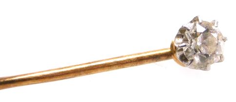An early 20thC solitaire diamond stick pin, boxed, 0.25 carats, 0.8g