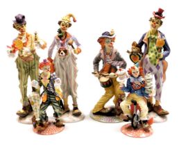 Six Leonardo Collection clown figures, comprising four Circus Comes To Town figures, and two Clownin