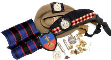 A Scottish King's Own Borderers cap, a beret, further badges, buttons, whistles, etc. (a quantity)