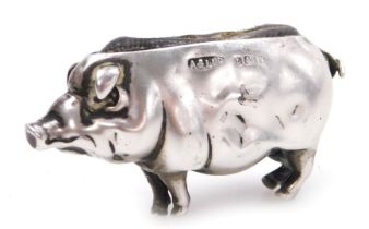 An Edward VII silver pin cushion modelled a pig, Birmingham 1906, 5cm wide.