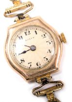 A mid century Rolex 9ct gold cased lady's wristwatch, circular dial with engine turned decoration, b