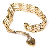 A 9ct gold five bar gate bracelet, on a heart shaped padlock clasp, 5.9g.