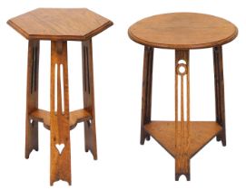 A late 19thC Arts & Crafts style oak occasional table, with a hexagonal top, raised on carved legs u