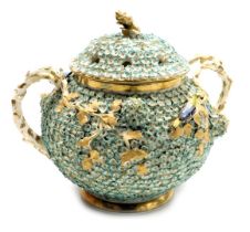 A 19thC porcelain Schneeballen potpourri vase and cover, of twin handled form, encrusted with flower