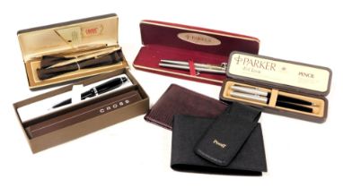 Parker and Cross pen sets, boxed, together with a Piaget wallet and pen holder, and a leather wallet