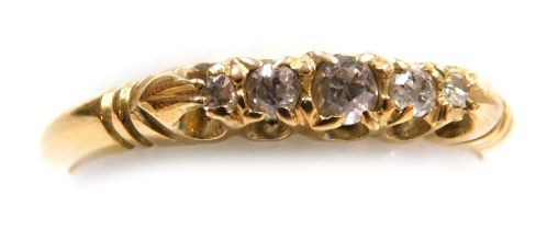An 18ct gold and rose cut five stone diamond ring, in a claw setting, size P½, 3.0g.