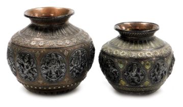 A graduated pair of 19thC Indian Damascus vases, the copper bodies overlaid in brass and silver, wit