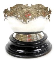 A Victorian silver rose bowl, with a gadrooned rim, with metal grill and ebonised socle, Wakely & Wh