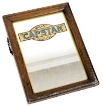 An early 20thC Wills's "Capstan" Navy Cut cigarettes advertising mirror, oak framed, 34.5cm x 24.5cm