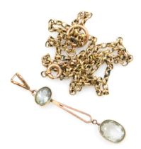 An Edwardian 9ct gold and gem set pendant, possibly aquamarine, together with a 9ct gold belcher lin