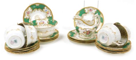 A late 19thC Coalport porcelain part tea service for Mortlocks Limited of London, decorated with res