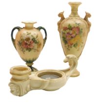An early 20thC Royal Worcester blush porcelain Roman oil lamp formed candle holder, c1903, with a sc