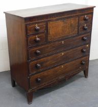 A mahogany and line inlaid secretaire chest, the central fall opening to reveal four drawers and six
