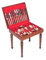 An Osborne silver plated King's pattern canteen of cutlery, six piece settings, in a tooled red leat
