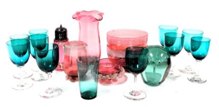 A group of Victorian glass, including a green glass flower pot dump, pair of cranberry glass bowls a