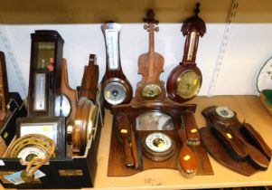 Wheel barometers and two barometer brush sets. (12)